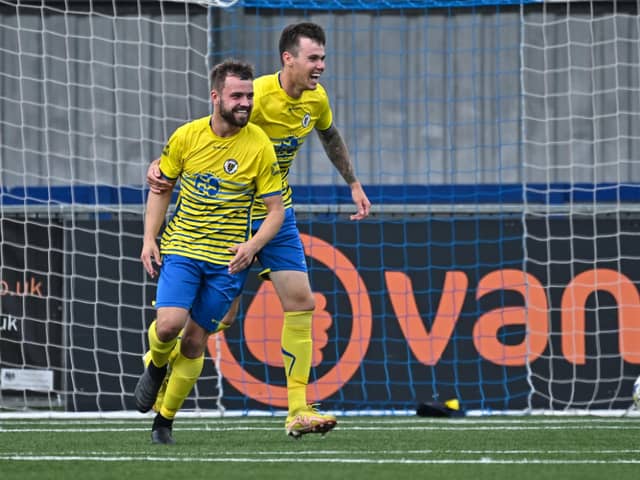 Jake Smith, left, with Conor Hilton after scoring one of his three goals in Locks Heath's 5-0 win against Clanfield at Westleigh Park. Picture by Richard Murray.