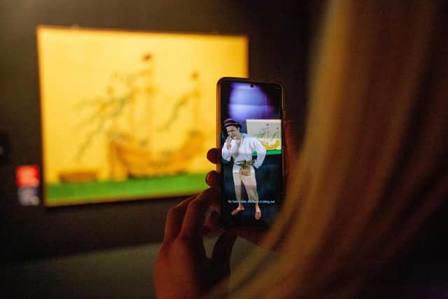 Mary Rose multi-sensory Augmented Reality experiece at the Mary Rose Museum, Historic Dockyard, Portsmouth on 7th July 2022
Pictured: News reporter, Elsa Waterfield using the app around the Mary Rose Museum
Picture: Habibur Rahman