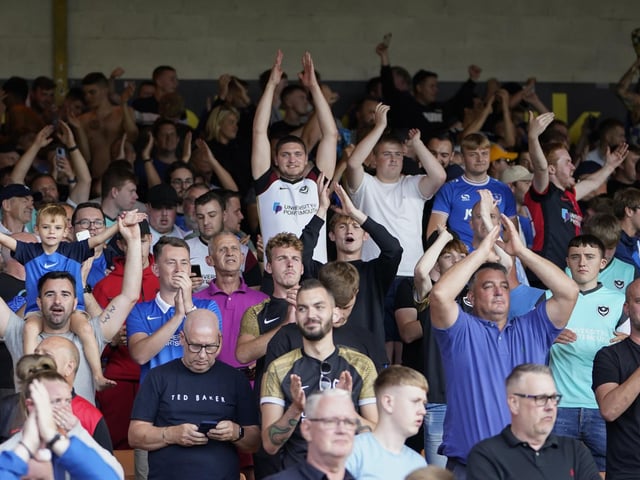 Pompey's 1,680 travelling away support applaud their team at the final whistle.