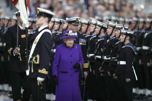 Queen Elizabeth II arrives for the commissioning ceremony of HMS Queen Elizabeth into the Royal Navy at Portsmouth Harbour in 2017
Picture: Andrew Matthews/PA Wire