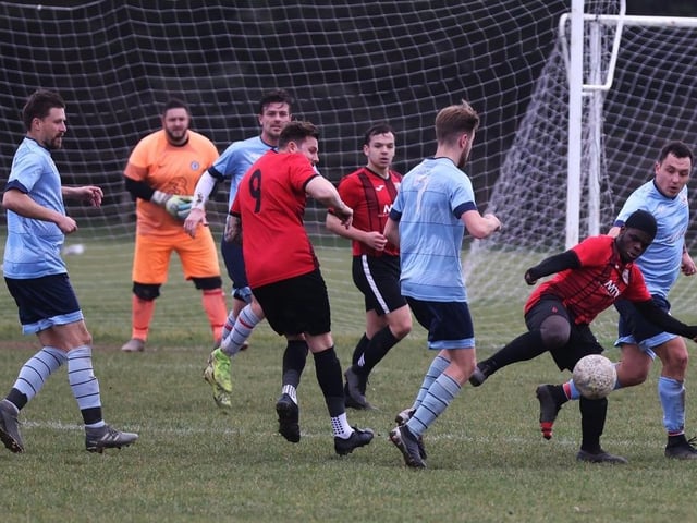 Portchester Rovers (blue) v Horndean United. Picture: Sam Stephenson