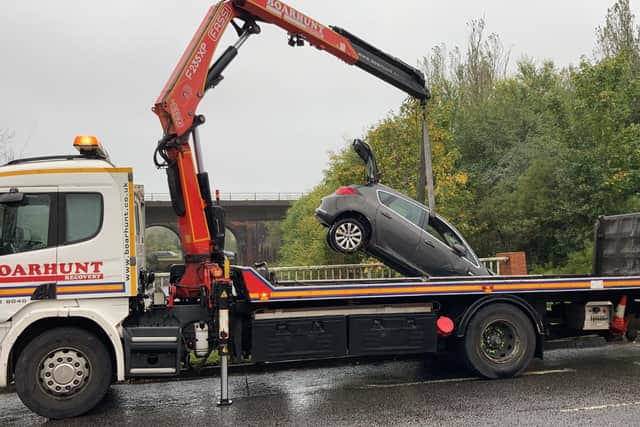 Car is fished out of the water at Delme Roundabout in Fareham after crash. Picture: Kimberley Barber
