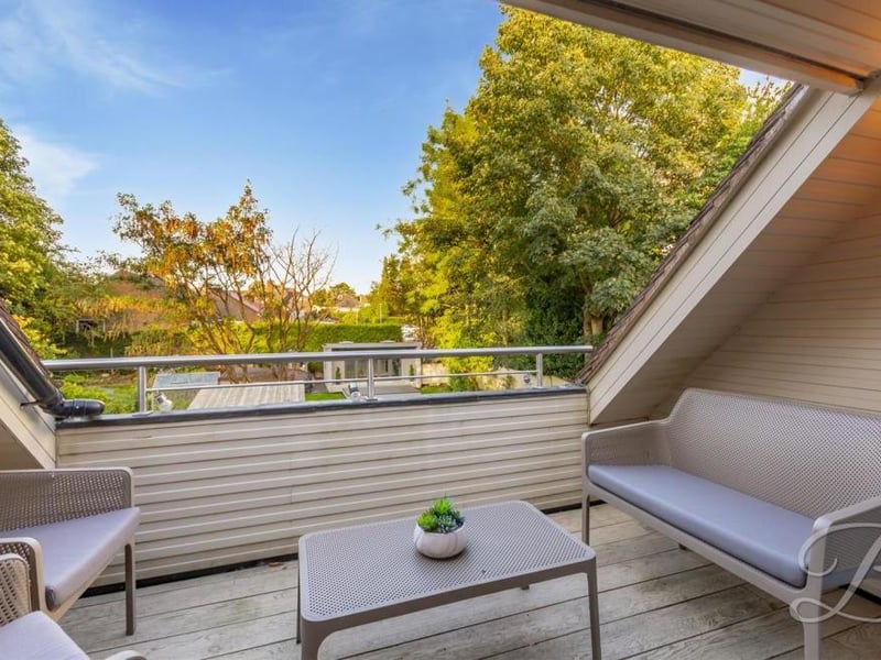 Check out the view from the balcony in the master bedroom. It overlooks the back garden.