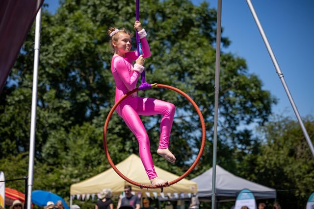 Ruby Shepherd (11) from 'Luna Acrobatics & Aerial Arts' giving a Pink Panther performance at the Rainbow Centre Family Fun Day. Picture: Mike Cooter (240623)