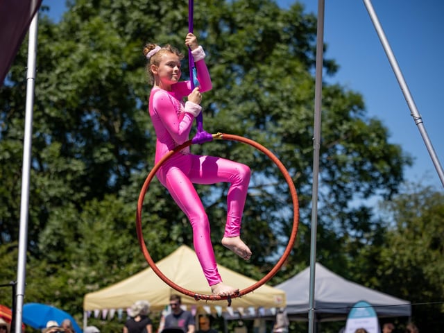 Ruby Shepherd (11) from 'Luna Acrobatics & Aerial Arts' giving a Pink Panther performance at the Rainbow Centre Family Fun Day. Picture: Mike Cooter (240623)