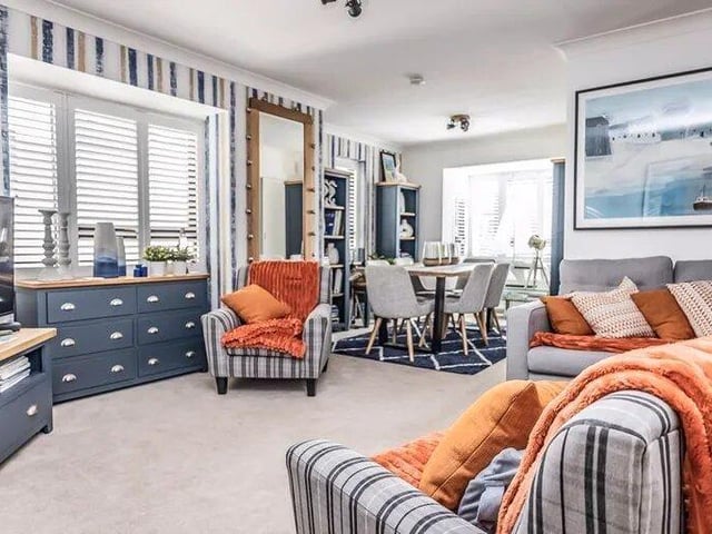 This property comes with two bedrooms, two bathrooms and a reception room as well as parking.