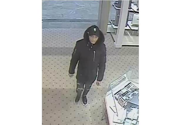 Officers have released CCTV images of a man they want to speak to after more than £23,000 worth of watches were stolen from a jewellery store in Southampton.