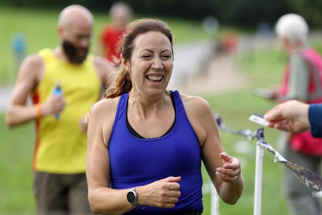 Ruth Stanbridge is all smiles as the first women across the line. Picture: Chris Moorhouse (jpns 310721-19)
