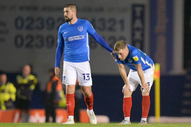 Kieron Freeman and Joe Morrell at the final whistle following Ipswich's 4-0 win against Pompey.