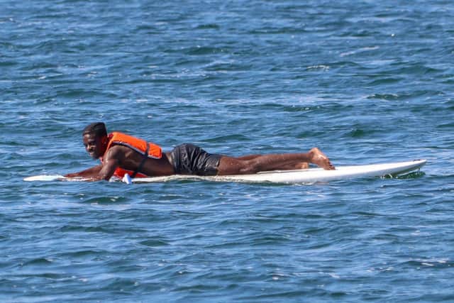 Jay Mingi awaits his rescue by his Pompey team-mates after the team took part in some water sports in Spain. Pic: Portsmouth FC