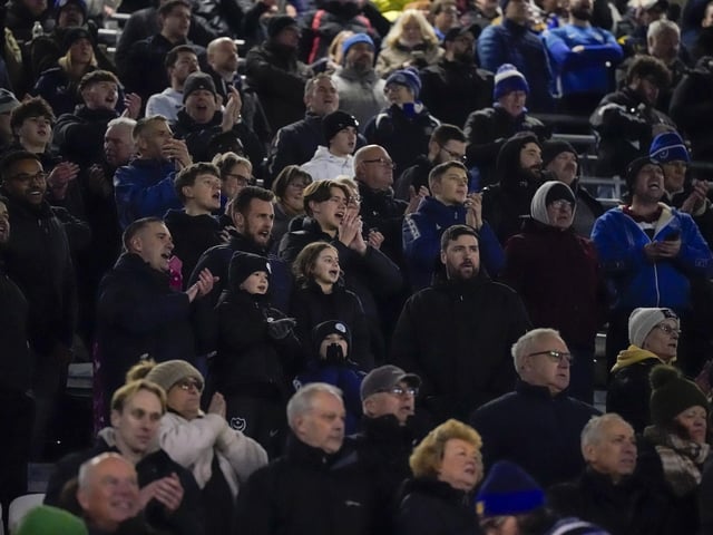 Pompey fans backed their team to a crucial Championship survival win over Cardiff last night.
