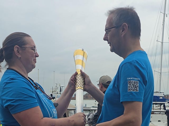 Rod handing baton over