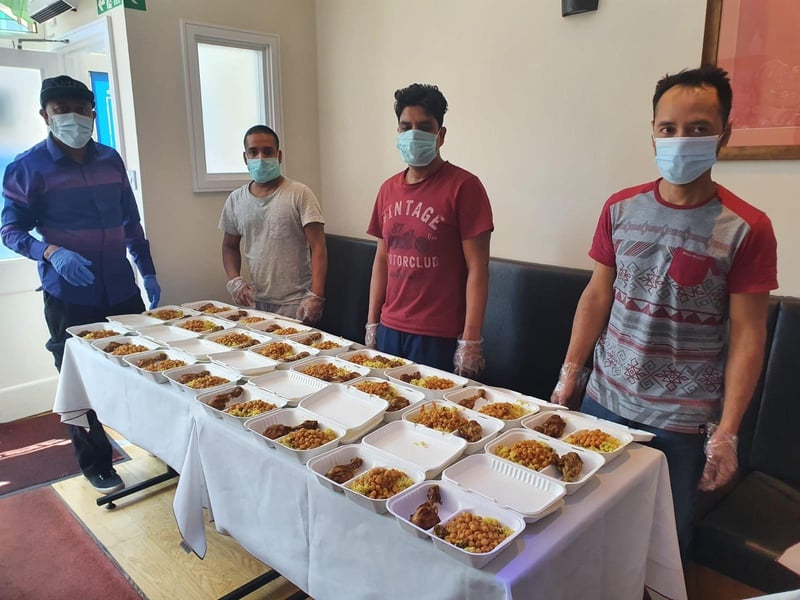 New Taj Mahal Indian takeaway was given two votes by our readers. Pictured: Staff at New Taj Mahal who donated Iftar meals to Portsmouth meals.