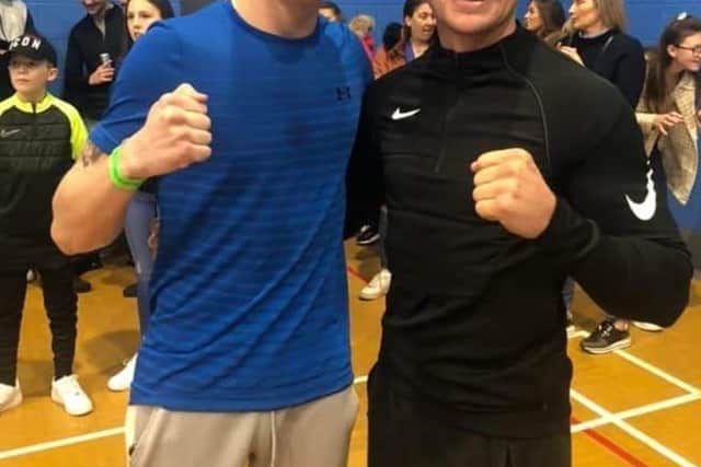Jack Carter, left, with professional fighter Sam Noakes after his pre-quarter-final win in Kent on Saturday