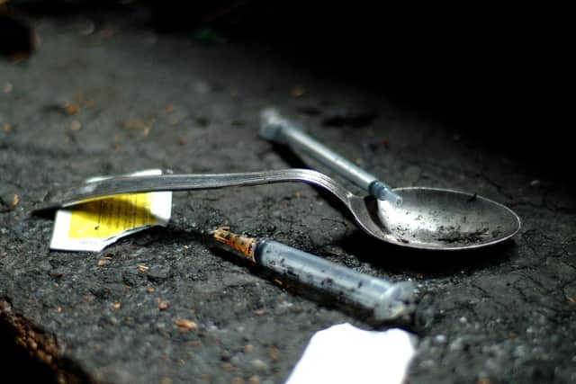 Spoon and needles by drug addicts