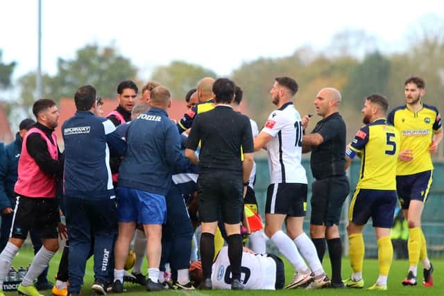 Players and management from both Gosport and Salisbury come together in the FA Trophy tie. Picture: Tom Phillips