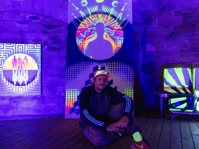 Mark Kellett with part of his exhibition, Out of My Mind. Picture by Matthew Clark