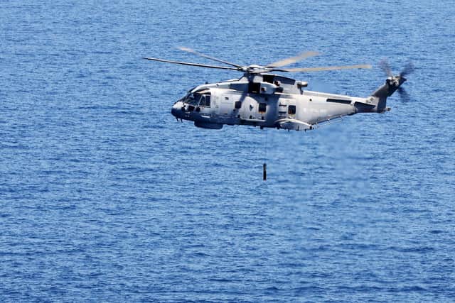 MERLIN MK2 CONDUCTS ANTI-SUBMARINE OPERATIONS - 6/7/16Today, 6th July 2016 HMS Ocean conducted flightdeck operations with Merlins Mk2s from 814 Naval Air Squadron (NAS), Seaking Mk7 from 849 NAS and a Wildcat from 815 NAS.HMS Ocean is currently on an operational deployment conducting an anti-submarine exercise.