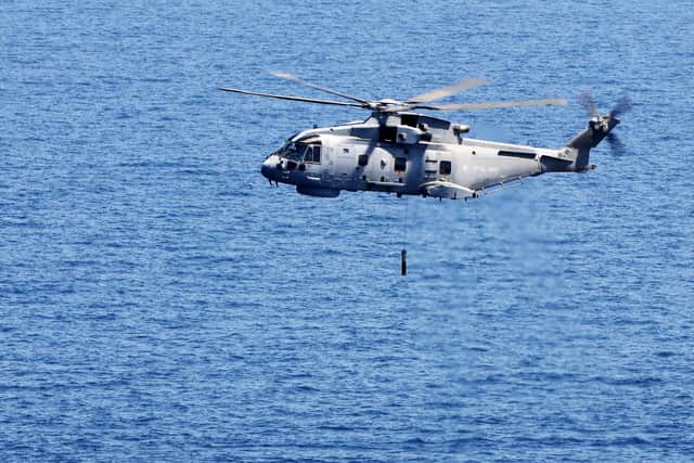 MERLIN MK2 CONDUCTS ANTI-SUBMARINE OPERATIONS - 6/7/16

Today, 6th July 2016 HMS Ocean conducted flightdeck operations with Merlins Mk2s from 814 Naval Air Squadron (NAS), Seaking Mk7 from 849 NAS and a Wildcat from 815 NAS.

HMS Ocean is currently on an operational deployment conducting an anti-submarine exercise.