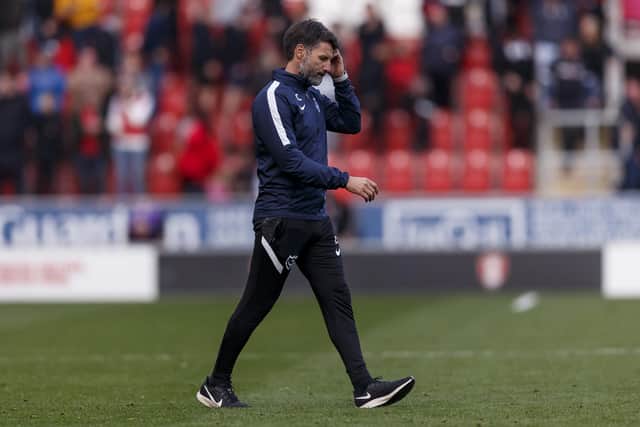 Pompey Danny Cowley looks dejected following Pompey's 4-1 defeat at Rotherham. Picture: Daniel Chesterton/phcimages.com