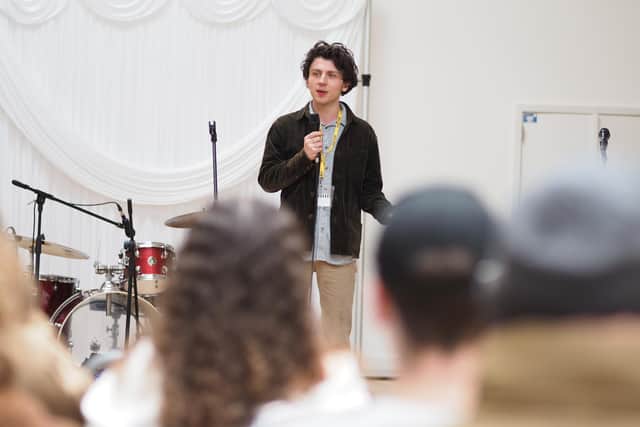 Musician Jack Flanagan talking to St Vincent Sixth Form College and Richard Taunton Sixth Form College students at the start of the Art For Earth's Sake project