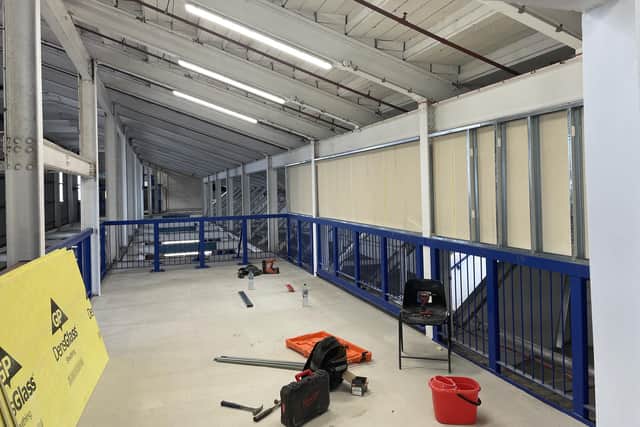 One of the new milling areas introduced into the North Stand to accommodate people using the nearby kiosks