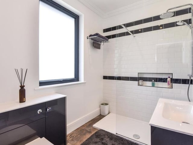 The property has four bathrooms, all of which are designed in a modern way.