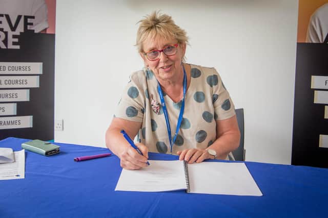 Pictured: Penny Wycherley, principal of Highbury College signing the official papers at Highbury College, Portsmouth.
Picture: Habibur Rahman