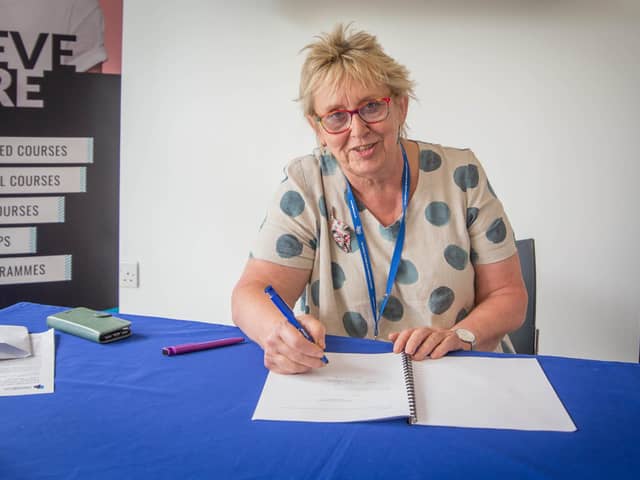 Pictured: Penny Wycherley, principal of Highbury College signing the official papers at Highbury College, Portsmouth.

Picture: Habibur Rahman