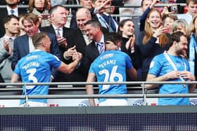 Mark Catlin and the board celebrate with the players at Wembley two years ago