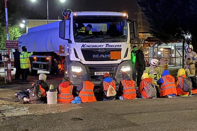 Just Stop Oil during their blockade of Esso Birmingham Fuel Terminal early on Friday (location not given). Picture date: Friday April 1, 2022. PA Photo. See PA story POLICE Protests. Photo credit should read: Just Stop Oil/PA Wire