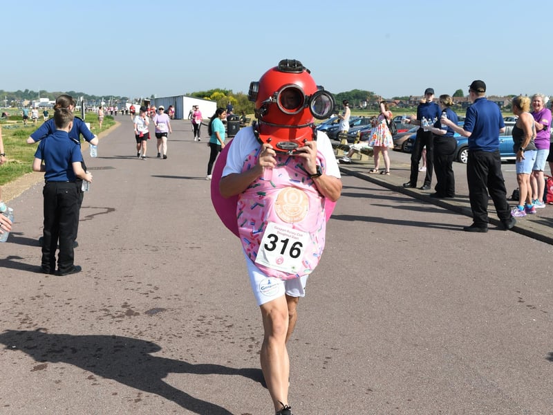 Alan Tottle with a diving helmet. 
Credit: Paul Jacobs/pictureexclusive.com