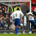 Sulley Muntari smashes the ball past stand-in Manchester United goalkeeper Rio Ferdinand during Pompey's FA Cup win at Old Trafford in 2008. Picture: Richard Heathcote/Getty Images