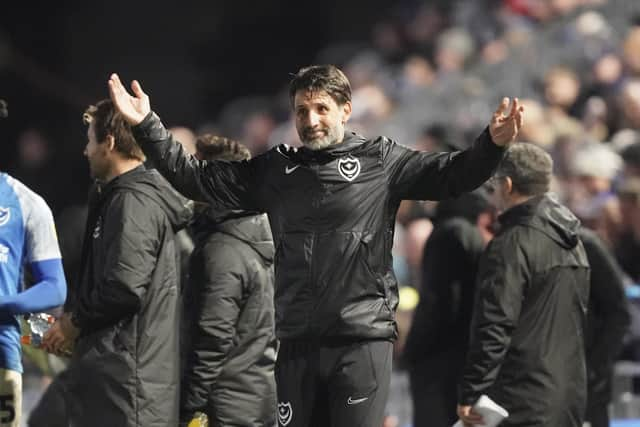 Pompey boss Danny Cowley tries to get the fans going during the goalless draw with Derby.