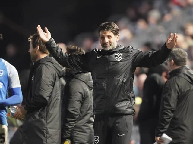 Pompey boss Danny Cowley tries to get the fans going during the goalless draw with Derby.