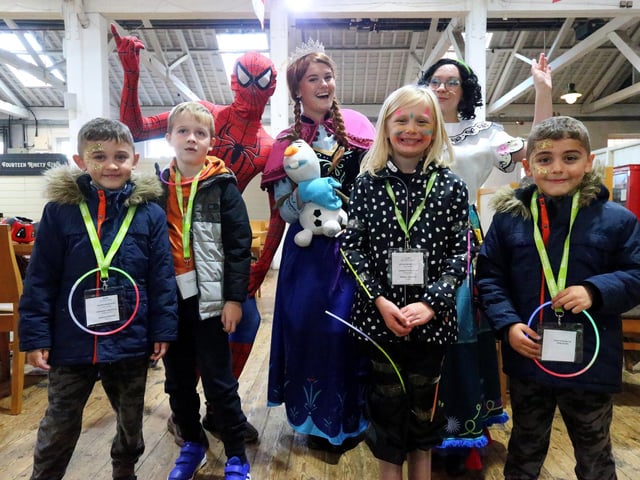 From left, Arthur White, 6, Archie Emmence, 6, Rayah Holland, 8, and George White, 6, with characters from Little Hopes and Dreams. Starlit Walk in aid of Rowans Hospice, Portsmouth Historic Dockyard, HM Naval Base PortsmouthPicture: Chris Moorhouse (jpns 261023-09)