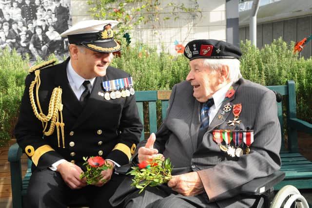 Commodore JJ Bailey, commander of Portsmouth Naval Base pictured with Polish veteran Colonel Otton Hulacki during last year' Poppy Appeal launch at Gosport's submarine museum
Picture: Sarah Standing (251019-194)
