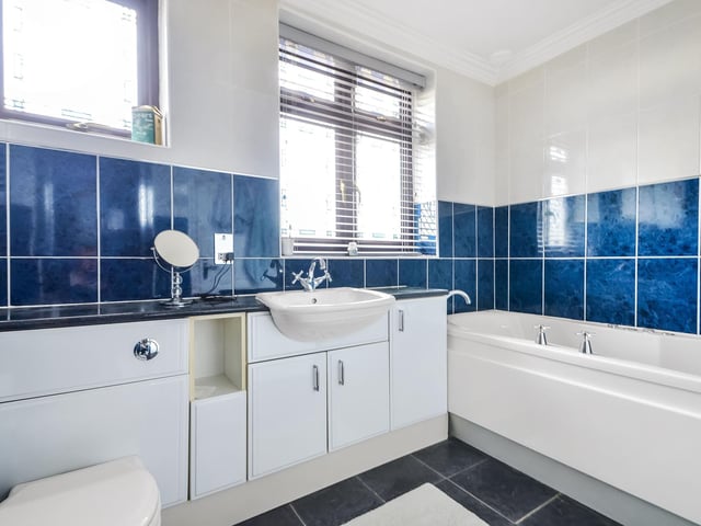 This semi-detached family home is on the market with a guide price of £725,000. It is listed by Fine and Country
