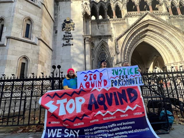 Activists have rallied outside the Royal Courts of Justice as the fate of the Aquind project goes before a judge