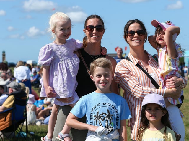 From left to right: Cora, 3, with Martika Galloway, and Harry, 7. Nerissa Pang holding Ada, 3, with Winter, 4, as they enjoy the sunny conditions.Picture: Chris  Moorhouse (270724-17)