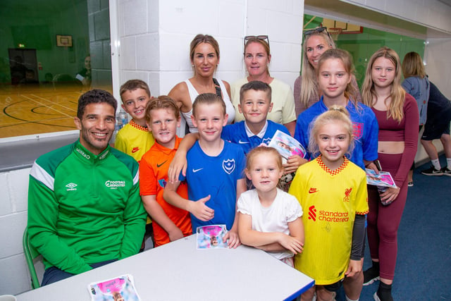Pictured: David James with some of his fans at Bay School, Gosport