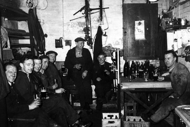 Workers at United Breweries in Portsmouth, gathered for a pre-Christmas drink in the late 1950's.