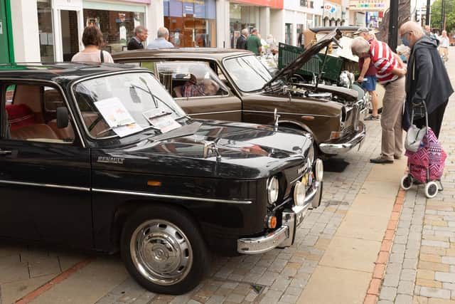 Pictured is: Vintage vehicles lined up for inspectionPicture: Keith Woodland (110921-10)