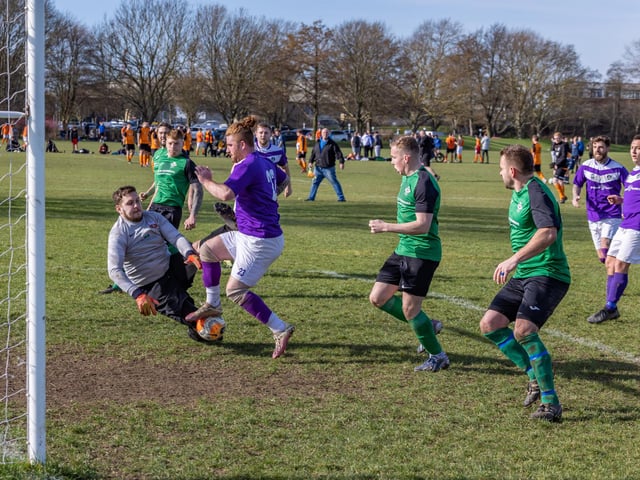 AFC Hilsea (purple) v Saturn Royale. Picture: Mike Cooter