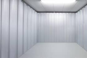 Empty garage sized storage unit awaiting donations
