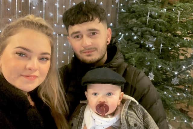 Chloe Whitehead, 23, her partner James Carruthers, 27, and their son Arlo