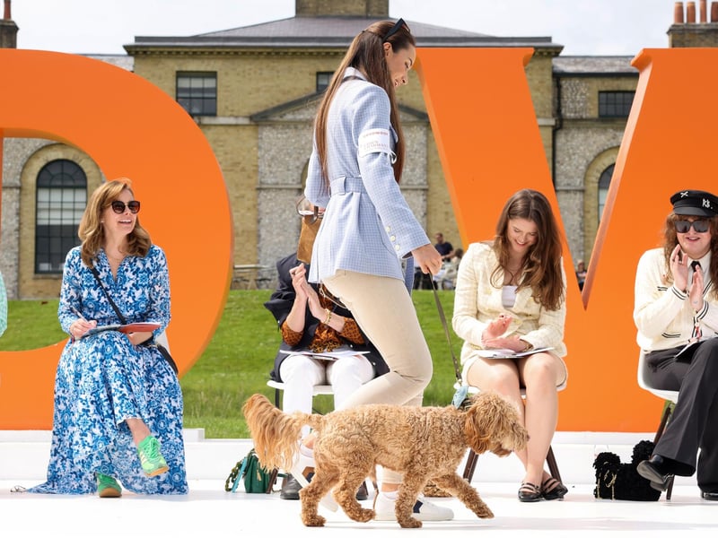 Dame Darcey Bussell (left) during the Chien Charamant at Goodwoof 2024, a dog event held at Goodwood Estate in Chichester. PA Photo. This year's event features a Labrador Parade, led by The Duke of Richmond, in celebration of the breed. Elsewhere at the event, visitors can try forest bathing, truffle hunting, watch top canine athletes in competition, enjoy wellness workshops and listen to talks from behavioural and veterinary experts. Picture credit should read: Matt Alexander/PA Media