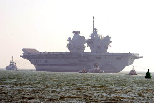 HMS Queen Elizabeth leaving Portsmouth on Monday, March 1.
Picture: Sarah Standing (010321-1756)