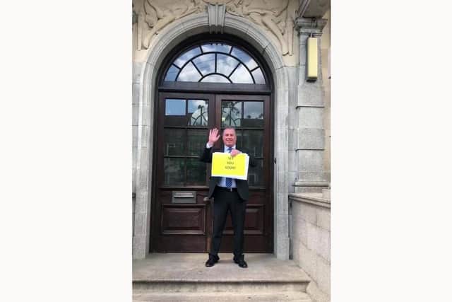Mayfield School headteacher, David Jeapes, shows a message of hope for students as part of the school's staff video for pupils.