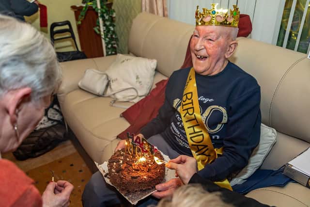 Jack with his 100th birthday cake. Picture: Mike Cooter (030222)